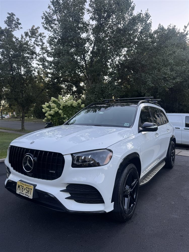 Freshly washed white Mercedes-Benz GLS AMG SUV