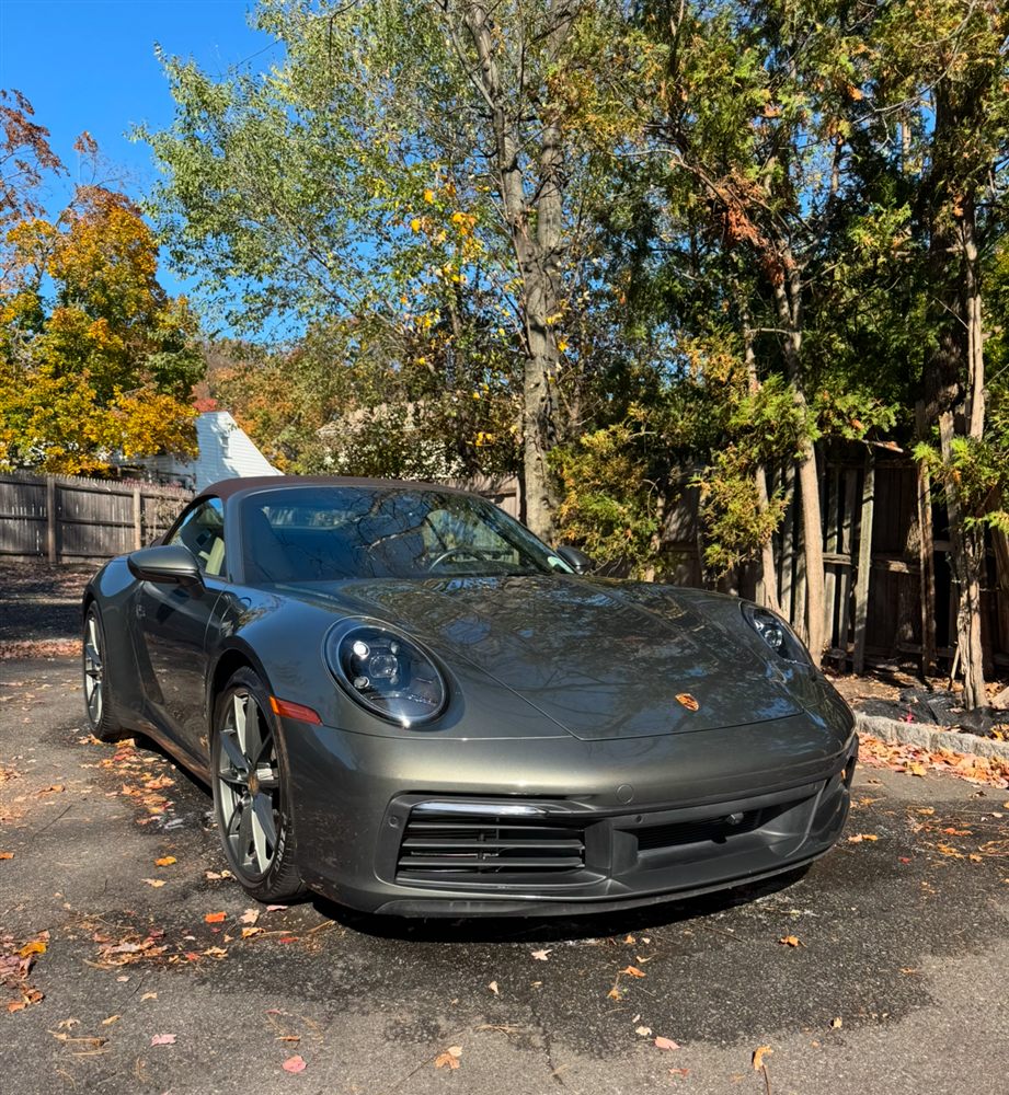 Freshly washed grey Porsche 911 convertible